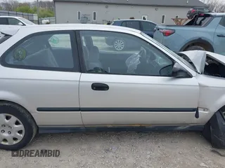 2000 Honda Civic DX z VIN 2HGEJ644XYH104197, wystawiony jako IAAI lot #42005938 z przebiegiem 125 321 mil mil oraz . Historia ofert i sprzedaży dostępna na DreamBid. Obrazek 14.