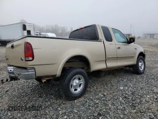 1999 Ford F-150 XL with VIN 1FTRX18L7XNB64656, listed as a Copart auction lot 84610454 with 0 mi miles and Salvage Title. Bid and sale history available at carsss.com. Image 3.
