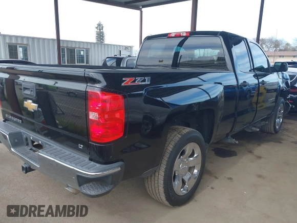 2014 Chevrolet Silverado 1500 LT with VIN 1GCVKREC5EZ325771, listed as a IAAI auction lot 41691858 with 123,475 mi miles and . Bid and sale history available at DreamBid. Image 4.