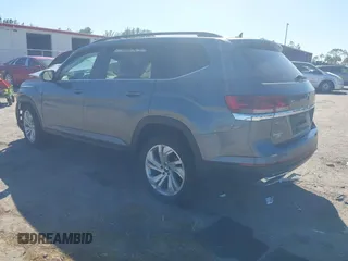 2021 Volkswagen Atlas SE z VIN 1V2WR2CA3MC602149, wystawiony jako IAAI lot #41845288 z przebiegiem 59 941 mil mil oraz . Historia ofert i sprzedaży dostępna na DreamBid. Obrazek 3.
