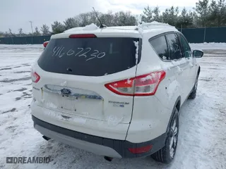 2016 Ford Escape Titanium with VIN 1FMCU9J91GUB84625, listed as a IAAI auction lot 41607230 with 161,775 mi miles. Bid and sale history available at carsss.com. Image 4.