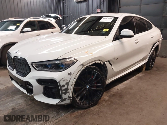 2022 BMW X6 M50i z VIN 5UXCY8C05N9J18577, wystawiony jako IAAI lot #41982042 z przebiegiem 64 155 mil mil oraz . Historia ofert i sprzedaży dostępna na DreamBid. Obrazek 2.