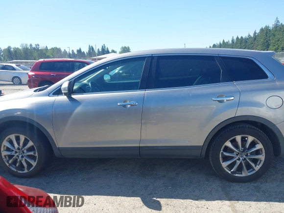 2014 Mazda CX-9 Grand Touring with VIN JM3TB2DA9E0435295, listed as a IAAI auction lot 42618683 with 177,783 mi miles and . Bid and sale history available at DreamBid. Image 14.