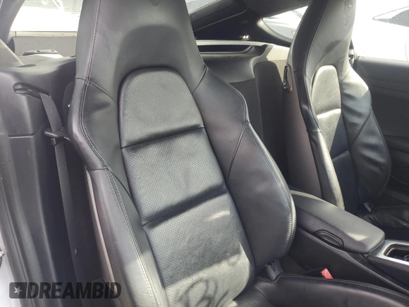 2014 Porsche Cayman с VIN WP0AA2A89EK171939, выставлен на аукционе Copart как лот 75397184 с пробегом 96 201 миль миль и На запчасти • Non repairable. История ставок и продаж доступна на DreamBid. Изображение 10.