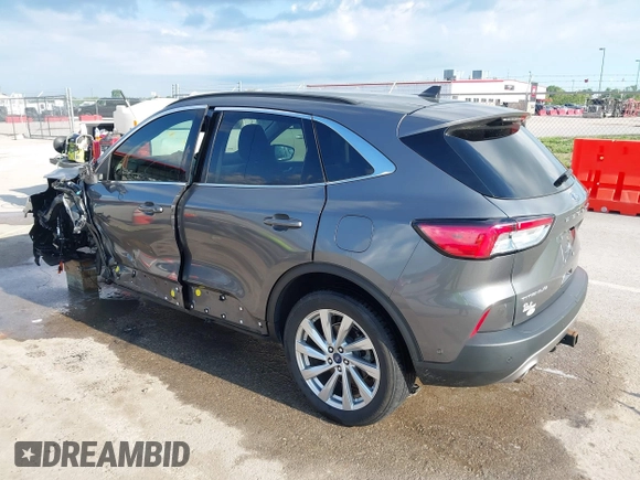 2022 Ford Escape Titanium with VIN 1FMCU9J90NUB35428, listed as a IAAI auction lot 42255369 with 33,662 mi miles and . Bid and sale history available at DreamBid. Image 3.