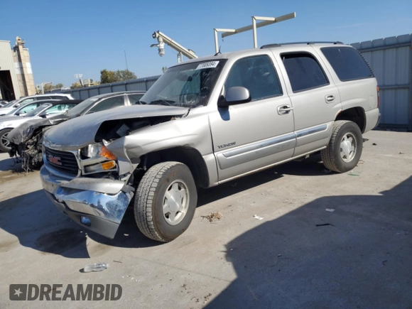 2005 GMC Yukon SLE with VIN 1GKEC13T95J221417, listed as a Copart auction lot 77009394 with 308,033 mi miles and Salvage Title. Bid and sale history available at carsss.com. Image 1.
