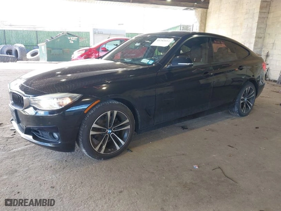 2014 BMW 3 Series Gran Turismo 328i xDrive with VIN WBA3X5C55ED242955, listed as a IAAI auction lot 41743111 with 71,095 mi miles. Bid and sale history available at carsss.com. Image 2.