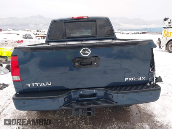 2015 Nissan Titan SV z VIN 1N6AA0ECXFN507260, wystawiony jako IAAI lot #41203612 z przebiegiem 103 000 mil mil oraz . Historia ofert i sprzedaży dostępna na DreamBid. Obrazek 16.