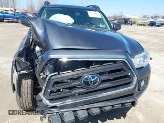 2021 Toyota Tacoma 4WD SR with VIN 3TMCZ5AN7MM442237, listed as a IAAI auction lot 41993450 with 30,148 mi miles. Bid and sale history available at carsss.com. Image 6.