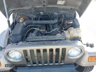 2006 Jeep Wrangler Sport Right Hand Drive with VIN 1J4F449S46P716520, listed as a IAAI auction lot 41763887 with 236,816 mi miles. Bid and sale history available at carsss.com. Image 10.
