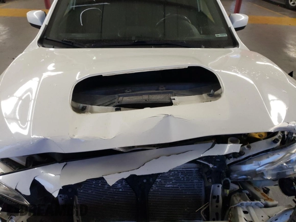 2017 Subaru WRX Premium with VIN JF1VA1E61H9819702, listed as a Copart auction lot 70168302 with 121,922 mi miles. Bid and sale history available at carsss.com. Image 12.