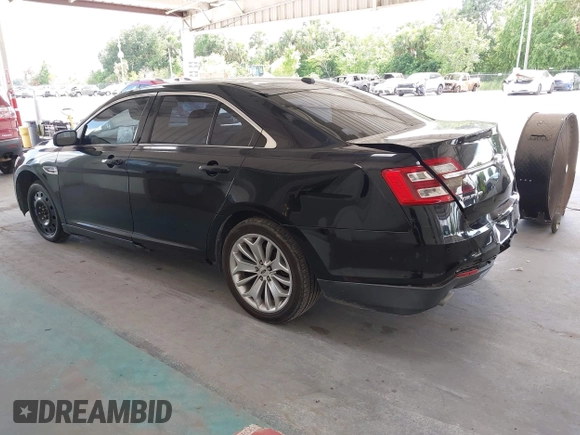 2017 Ford Taurus Limited z VIN 1FAHP2F81HG102598, wystawiony jako IAAI lot #42471410 z przebiegiem 165 386 mil mil oraz . Historia ofert i sprzedaży dostępna na DreamBid. Obrazek 3.