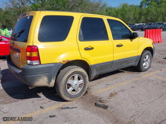 2003 Ford Escape XLS Popular with VIN 1FMYU92113KD90189, listed as a IAAI auction lot 42082279 with 261,215 mi miles. Bid and sale history available at carsss.com. Image 4.