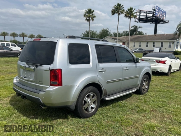 2010 Honda Pilot Touring with VIN 5FNYF3H86AB015716, listed as a Copart auction lot 54362235 with 229,256 mi miles and Clean Title. Bid and sale history available at carsss.com. Image 4.