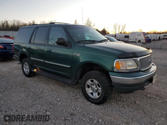 1999 Ford Expedition XLT with VIN 1FMPU18L0XLB96873, listed as a Copart auction lot 84449864 with 161,128 mi miles and Clean title. Bid and sale history available at DreamBid. Image 4.