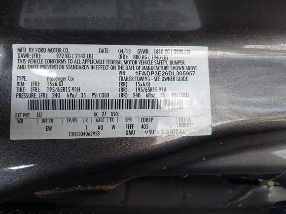 2013 Ford Focus S with VIN 1FADP3E26DL305957, listed as a IAAI auction lot 41715263 with 95,805 mi miles. Bid and sale history available at carsss.com. Image 9.