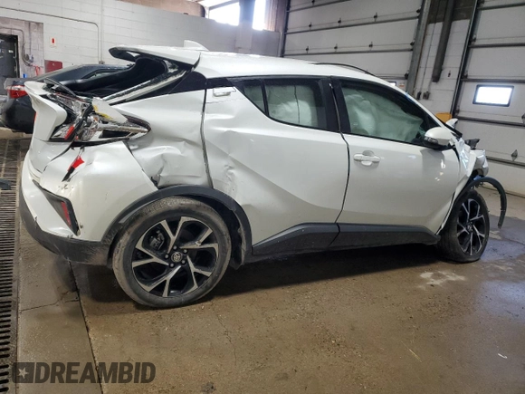 2021 Toyota C-HR LE z VIN NMTKHMBX2MR140040, wystawiony jako Copart lot #50598335 z przebiegiem Nie podano mil oraz Szkoda całkowita • Salvage title. Historia ofert i sprzedaży dostępna na DreamBid. Obrazek 3.