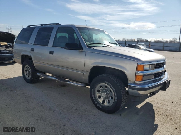 1999 Chevrolet Tahoe Z71 with VIN 1GNEK13R4XJ458295, listed as a Copart auction lot 47435675 with 211,422 mi miles and Salvage Title. Bid and sale history available at carsss.com. Image 4.