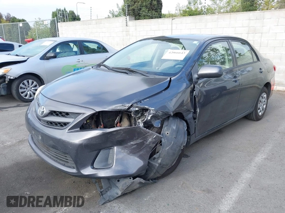 2011 Toyota Corolla L with VIN JTDBU4EE7B9162022, listed as a IAAI auction lot 42066643 with 124,384 mi miles. Bid and sale history available at carsss.com. Image 18.