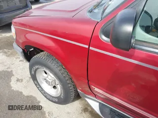 1998 Ford Explorer XL z VIN 1FMZU34E2WZB30557, wystawiony jako IAAI lot #41597870 z przebiegiem 164 778 mil mil oraz . Historia ofert i sprzedaży dostępna na DreamBid. Obrazek 12.