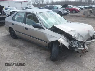 2000 Honda Civic LX with VIN 1HGEJ6670YL030749, listed as a IAAI auction lot 42112694 with 153,903 mi miles. Bid and sale history available at carsss.com. Image 1.