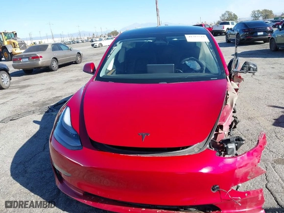 2021 Tesla Model 3 Performance with VIN 5YJ3E1EC7MF997237, listed as a IAAI auction lot 41387544 with 64,450 mi miles. Bid and sale history available at carsss.com. Image 12.