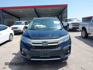 2019 Honda Pilot Touring 7-Passenger with VIN 5FNYF6H67KB031988, listed as a IAAI auction lot 42519588 with 41,368 mi miles and . Bid and sale history available at DreamBid. Image 12.