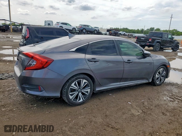 2018 Honda Civic EX-T with VIN JHMFC1F35JX018879, listed as a Copart auction lot 58633655 with 129,906 mi miles and Salvage title. Bid and sale history available at DreamBid. Image 3.