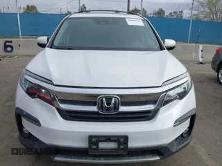 2020 Honda Pilot EX-L with VIN 5FNYF5H57LB003059, listed as a IAAI auction lot 41685916 with 114,742 mi miles. Bid and sale history available at carsss.com. Image 12.