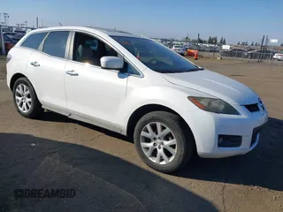 2007 Mazda CX-7 Grand Touring with VIN JM3ER293470138579, listed as a IAAI auction lot 41469876 with 129,223 mi miles. Bid and sale history available at carsss.com. Image 1.