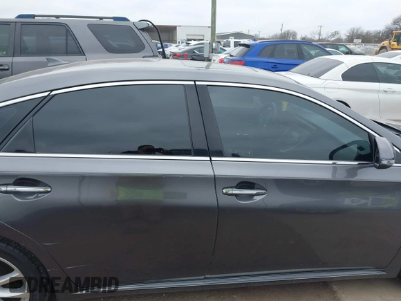 2015 Toyota Avalon Limited with VIN 4T1BK1EB4FU167011, listed as a IAAI auction lot 41582722 with 77,314 mi miles and . Bid and sale history available at DreamBid. Image 13.