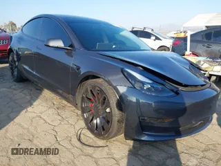 2023 Tesla Model 3 Performance with VIN 5YJ3E1EC7PF635722, listed as a IAAI auction lot 41536638 with 24,857 mi miles. Bid and sale history available at carsss.com. Image 1.