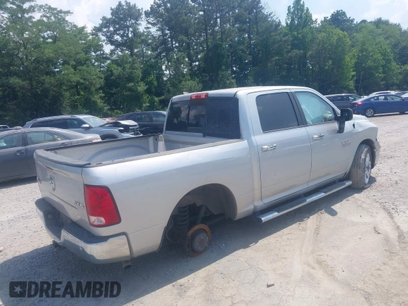 2015 Ram 1500 Big Horn with VIN 1C6RR7LG3FS509244, listed as a IAAI auction lot 42384583 with 216,899 mi miles and . Bid and sale history available at DreamBid. Image 4.