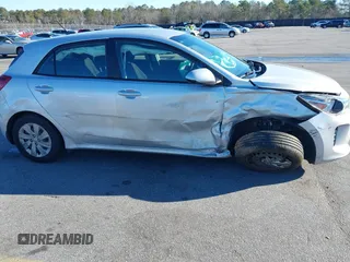 2020 Kia Rio S with VIN 3KPA25AD7LE348113, listed as a IAAI auction lot 41365528 with 43,633 mi miles and . Bid and sale history available at DreamBid. Image 6.