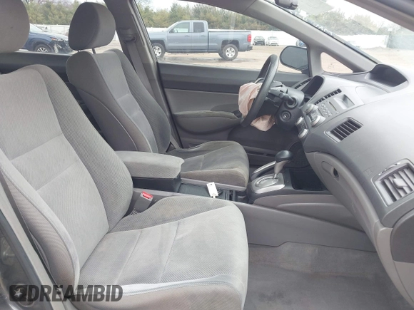 2011 Honda Civic LX with VIN 19XFA1F54BE032699, listed as a IAAI auction lot 42060272 with 197,905 mi miles and . Bid and sale history available at DreamBid. Image 5.