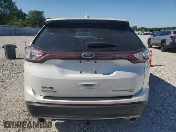 2015 Ford Edge Titanium z VIN 2FMTK4K84FBB64176, wystawiony jako Copart lot #57729005 z przebiegiem 50 654 mil mil oraz Szkoda całkowita • Salvage title. Historia ofert i sprzedaży dostępna na DreamBid. Obrazek 6.