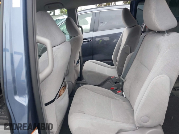 2015 Toyota Sienna LE AAS with VIN 5TDKK3DC7FS649602, listed as a IAAI auction lot 42152836 with 70,892 mi miles and . Bid and sale history available at DreamBid. Image 8.