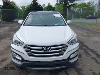 2013 Hyundai Santa Fe Sport z VIN 5XYZUDLB3DG122786, wystawiony jako IAAI lot #42199547 z przebiegiem 98 331 mil mil oraz . Historia ofert i sprzedaży dostępna na DreamBid. Obrazek 12.