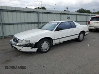 1992 Cadillac Eldorado z VIN 1G6EL13B0NU624500, wystawiony jako Copart lot #78516534 z przebiegiem 87 659 mil mil oraz Szkoda całkowita • Salvage title. Historia ofert i sprzedaży dostępna na DreamBid. Obrazek 1.