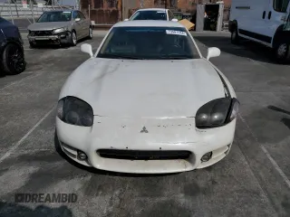 1999 Mitsubishi 3000GT z VIN JA3AM44H2XY002634, wystawiony jako Copart lot #73501144 z przebiegiem 70 229 mil mil oraz Tytuł czysty. Historia ofert i sprzedaży dostępna na DreamBid. Obrazek 5.