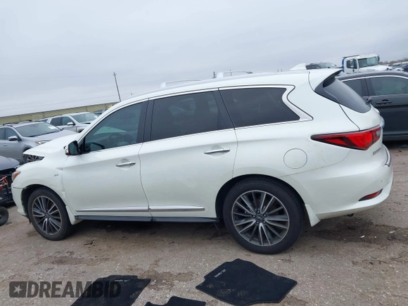 2020 Infiniti QX60 Pure with VIN 5N1DL0MN7LC545576, listed as a IAAI auction lot 41615817 with 62,858 mi miles and . Bid and sale history available at DreamBid. Image 14.