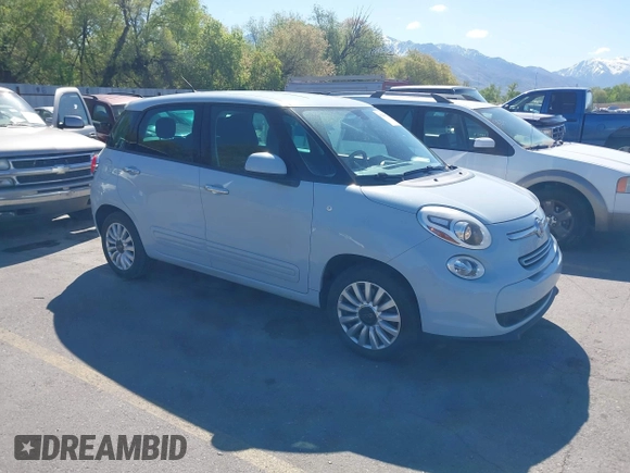 2014 FIAT 500L Easy with VIN ZFBCFABH9EZ010519, listed as a IAAI auction lot 42150633 with 60,724 mi miles. Bid and sale history available at carsss.com. Image 1.