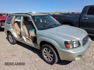 2005 Subaru Forester XS with VIN JF1SG65635H714028, listed as a Copart auction lot 58395405 with 98,134 mi miles and Salvage title. Bid and sale history available at DreamBid. Image 4.