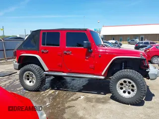 2008 Jeep Wrangler Unlimited X z VIN 1J4GA39198L652015, wystawiony jako IAAI lot #42062691 z przebiegiem 127 804 mil mil oraz . Historia ofert i sprzedaży dostępna na DreamBid. Obrazek 13.
