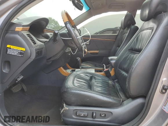 2006 Hyundai Azera SE with VIN KMHFC46F46A105028, listed as a Copart auction lot 59569815 with 219,201 mi miles and Salvage title. Bid and sale history available at DreamBid. Image 7.