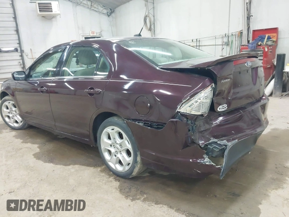 2011 Ford Fusion SE with VIN 3FAHP0HAXBR308930, listed as a IAAI auction lot 42028352 with 116,116 mi miles. Bid and sale history available at carsss.com. Image 3.