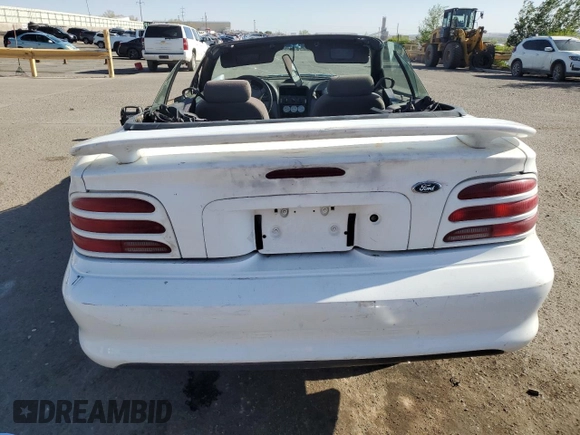 1994 Ford Mustang with VIN 1FALP45T8RF205391, listed as a Copart auction lot 54699065 with 167,335 mi miles and Salvage title. Bid and sale history available at DreamBid. Image 6.