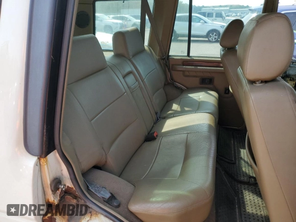 1998 Land Rover Discovery SD z VIN SALJY1246WA781850, wystawiony jako Copart lot #69113644 z przebiegiem 58 468 mil mil oraz Czysty tytuł • Clean title. Historia ofert i sprzedaży dostępna na DreamBid. Obrazek 11.