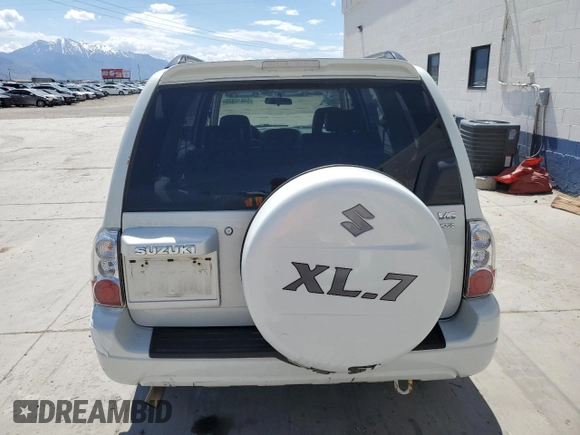 2004 Suzuki XL7 LX z VIN JS3TX92V344101698, wystawiony jako Copart lot #54610825 z przebiegiem 118 152 mil mil oraz Szkody całkowita. Historia ofert i sprzedaży dostępna na DreamBid. Obrazek 6.