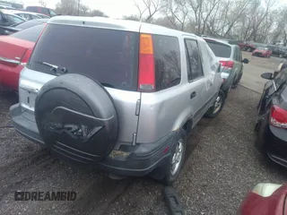 1997 Honda CR-V with VIN JHLRD1841VC002597, listed as a IAAI auction lot 36104231 with 297,037 mi miles. Bid and sale history available at carsss.com. Image 4.